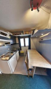 Η κουζίνα ή μικρή κουζίνα στο MyHome - Plein Soleil 36 - Studio cabine 4 pax ski in&out