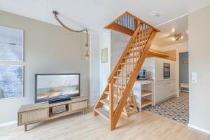 TV a/nebo společenská místnost v ubytování Beach Break