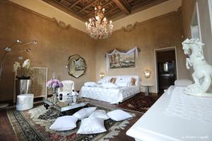 Postel nebo postele na pokoji v ubytování Villa Ghiringhelli