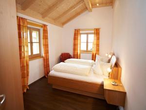 Ένα ή περισσότερα κρεβάτια σε δωμάτιο στο Wimmerhof