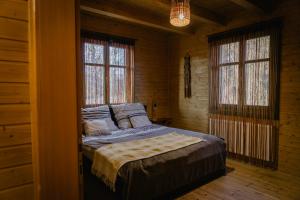 Postel nebo postele na pokoji v ubytování Nyárfás Birtok