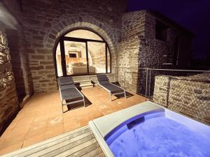 The swimming pool at or close to Torre Medieval de Queralt & Spa