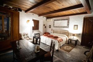 Postel nebo postele na pokoji v ubytování Villa Ghiringhelli