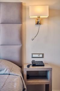 Voodi või voodid majutusasutuse Altura Hotel Zakynthos toas