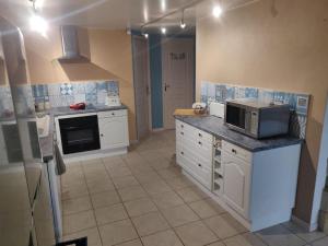 Kuchyňa alebo kuchynka v ubytovaní Gîte des 4 éléments