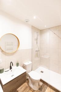 Kúpeľňa v ubytovaní Luz - Appartement hyper centre Saint-Etienne