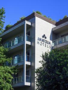 a building with the amazonalo hotels sign on it at Anatolia Hotel in Thessaloniki