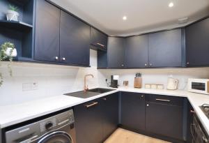 Η κουζίνα ή μικρή κουζίνα στο The Warren Apartment