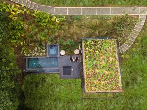 an overhead view of a garden with a swimming pool at Bio Habitat hotel in Armenia