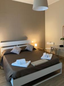 Postel nebo postele na pokoji v ubytování B&B L'Airone