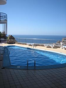 The swimming pool at or close to Apartamentos Miriam