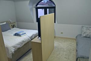 Letto o letti in una camera di City SMART