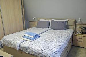 Letto o letti in una camera di City SMART