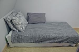 Letto o letti in una camera di City SMART