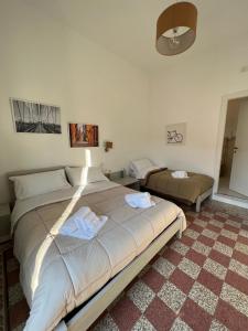 A bed or beds in a room at Bonadies64 B&B