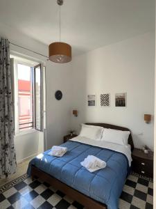A bed or beds in a room at Bonadies64 B&B
