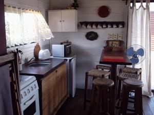 Una cocina o kitchenette en Terracota y Chocolate