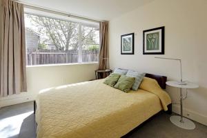 Krevet ili kreveti u jedinici u okviru objekta LEED Platinum Green Home Getaway