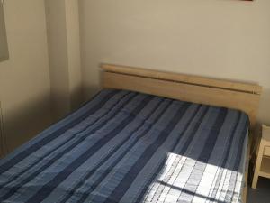 מיטה או מיטות בחדר ב-Maison Vaux-sur-Mer, 3 pièces, 4 personnes - FR-1-494-14