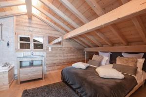 Chalet Le R'Posiao客房内的一张或多张床位