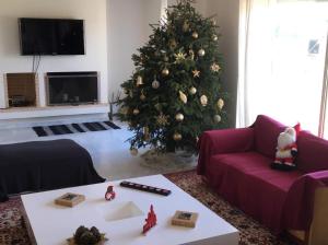 A seating area at Legrena Beach Villa