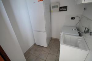 Kuchyň nebo kuchyňský kout v ubytování Attico Del Vico