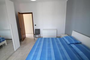 Postel nebo postele na pokoji v ubytování Attico Del Vico