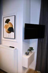 TV a/nebo společenská místnost v ubytování M-Keys Apartments Kraków Old Town Kazimierz