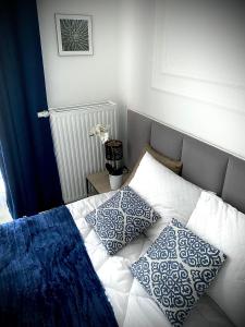 Postel nebo postele na pokoji v ubytování M-Keys Apartments Kraków Old Town Kazimierz