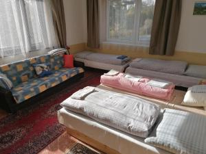 Postel nebo postele na pokoji v ubytování Pension MAAN