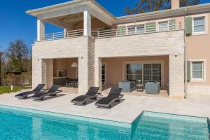 Bazén v ubytování Villa Estelle by ILC (Istria Luxury Collection) nebo v jeho okolí