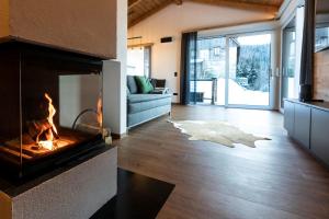 TV a/nebo společenská místnost v ubytování Seisen Almchalet