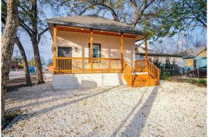 a small house with a porch and a deck at Magnificent 4BR Near Famous Riverwalk and Downtown in San Antonio