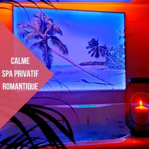 a television screen with a picture of a beach at Le doux refuge - SPA privatif - Romantique - Calme in Châteauroux
