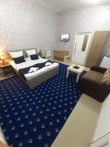 Postel nebo postele na pokoji v ubytování Lind Guest House B&B