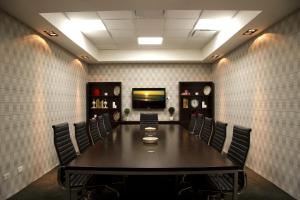 a conference room with a long table and chairs at Tango de Mayo Hotel in Buenos Aires