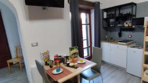 Kuchyň nebo kuchyňský kout v ubytování Pollino House