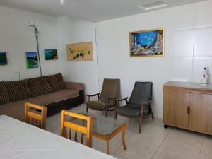 Posezení v ubytování PRAIA DE 4 ILHAS Apartamento 2 Quartos a 50M da Praia