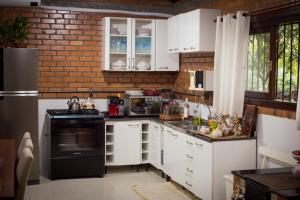 Kuchyň nebo kuchyňský kout v ubytování Pousada do Salto Ventoso / Serra Gaúcha Casa 1 + 47 fotografií