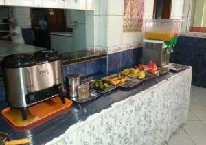 Hotel Paraiso Belém tesisinde mutfak veya mini mutfak