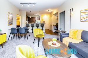 a living room with a couch and a table at Business Travel - Fast Wi-fi - Pets in Dallas
