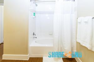 a bathroom with a shower and a sink at Business Travel - Fast Wi-fi - Pets in Dallas