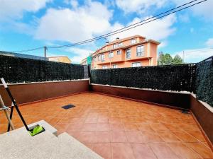 Balkón alebo terasa v ubytovaní Apartamento con terraza y piscina
