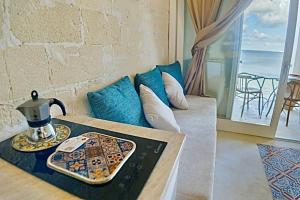 A seating area at CIELOMARE APARTMENTS - ODISSEA fisherman house Még 29 kép