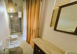 A bathroom at CIELOMARE APARTMENTS - ODISSEA fisherman house