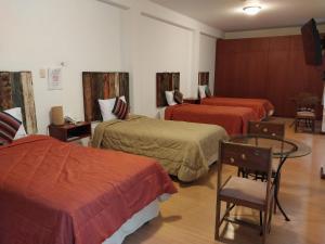 Postel nebo postele na pokoji v ubytování Fundo Hotel Ayarpongo + 34 fotografií