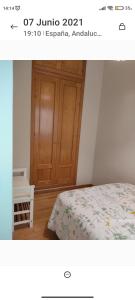 Ein Bett oder Betten in einem Zimmer der Unterkunft Málaga Centro