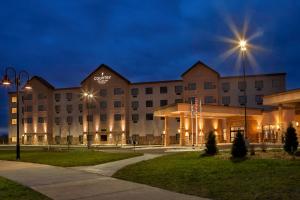 a rendering of a hotel at night at Country Inn & Suites by Radisson, Bemidji, MN in Bemidji