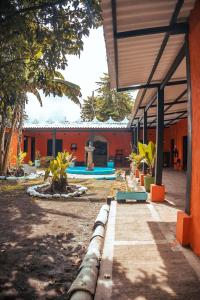 a courtyard of a building with a swimming pool at Casa Colonial in Mariquita