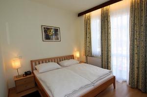 Posteľ alebo postele v izbe v ubytovaní Hotel Pension Alte Mühle